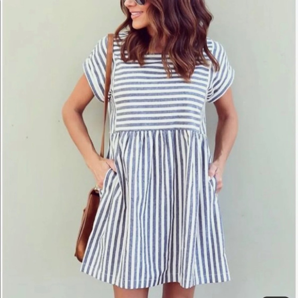 Baby doll dress size medium (6-8). NBW